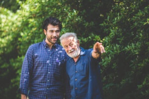 father-pointing-something-to-son