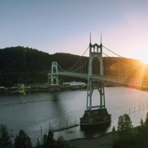 historical-suspension-bridge-over-river-at-sundown