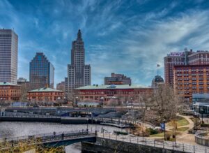 city-skyline-under-blue-sky-and-white-clouds