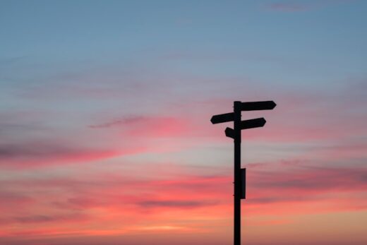 Signpost at sunset symbolizing choices during the Medicare Advantage Open Enrollment Period
