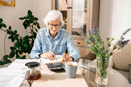 Elderly Woman Researching Medicare Part B Deductible Cost Changes